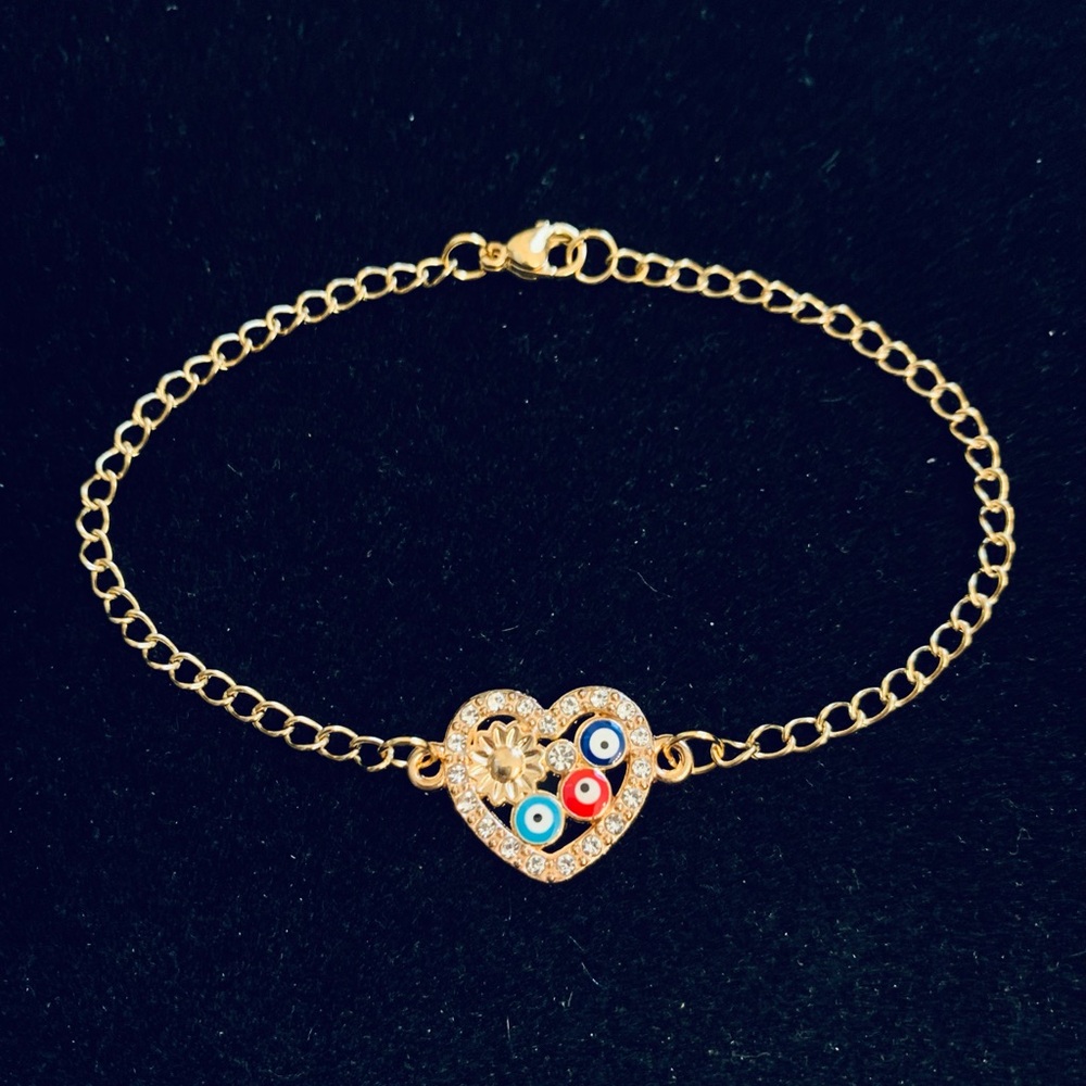 Rhinestone Multi colored evil eye bracelet (gold tone)
